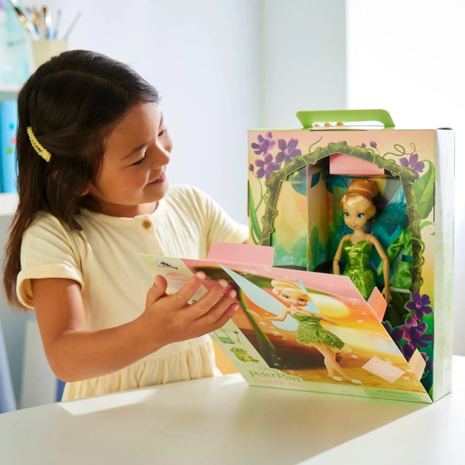 Disney Store Official Princess Story Doll - Tinker Bell from Peter Pan, 11 Inches, Includes Coloring Area and Additional Dress, Classic Outfit, Perfect for Girls