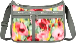 LeSportsac Chasing Flowers Deluxe Everyday Crossbody Bag   Cosmetic Bag, Style 7507/Color E546, Vibrant Tropical Soft Focus Flowers, Bokeh Style Art In Motion, Raspberry, Avocado & Sunny Yellow Blooms