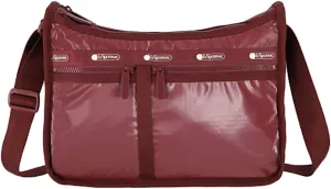 LeSportsac Coastal Cabernet Patent Deluxe Everyday Crossbody Bag   Cosmetic Bag, Style 7507/Color M217, Sultry Garnet/Burgundy Jewel Tone Specialty Patent, Modern Wide Tonal Zipper, Subtle Shimmer