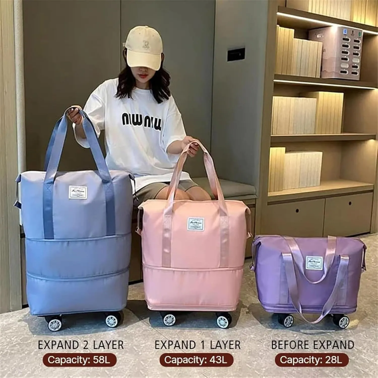 Travel Bag with Wheels - Expandable Foldie Wheeled Duffel 28-58L, Spinner Wheels, Waterproof - Perfect Carry On Luggage for Weekend Trips, Gym, Camping (Purple)